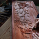 Hand carvings in traditional Chinese rosewood furniture.